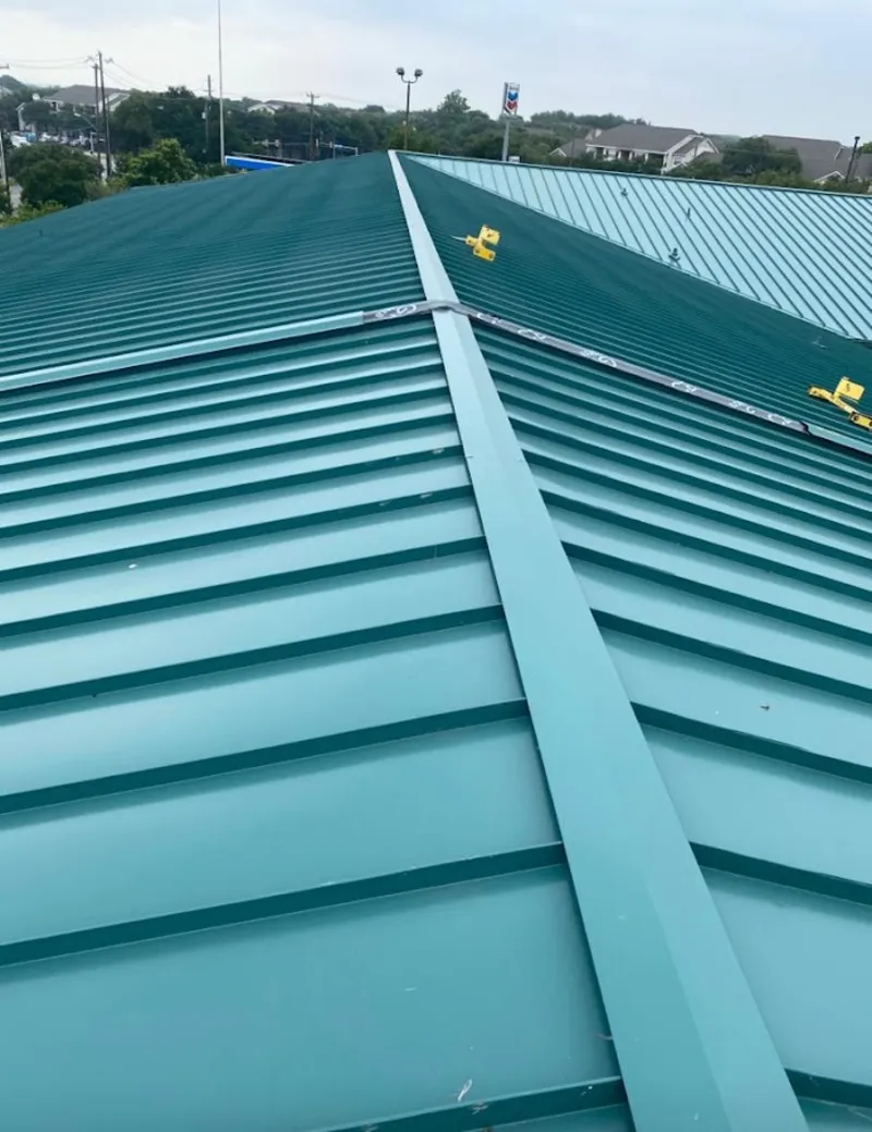 Green commercial metal roof ridge and valley for Metal Roof Repair in Moon